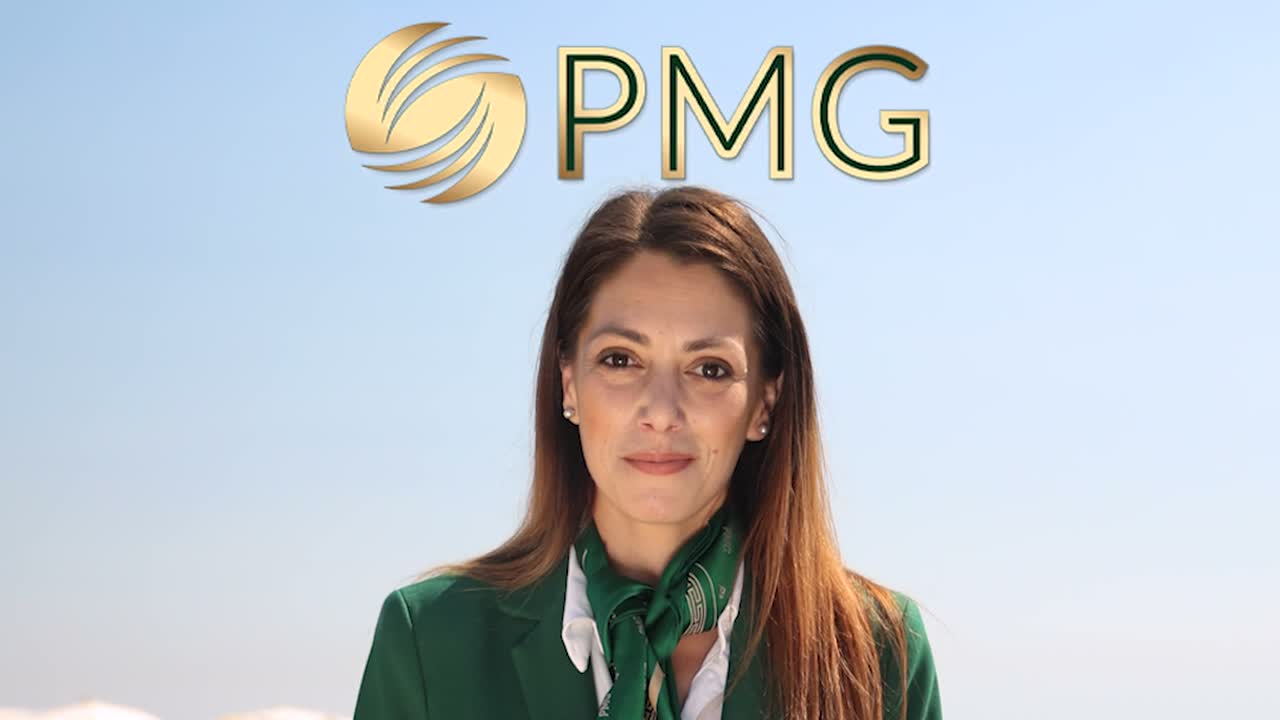 Still from the film: a PMG adviser on the beach in Cyprus